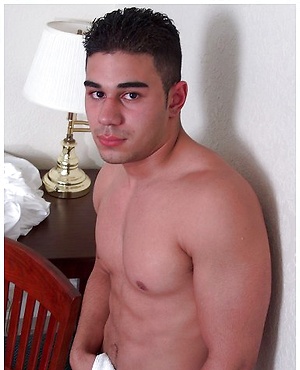 Omar plays with his cock by Nextdoor Male image 6