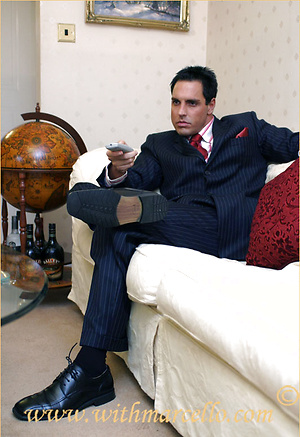 Horny Marcello wearing a pin stripe suit with bare feet and masturbating by With Marcello image 1