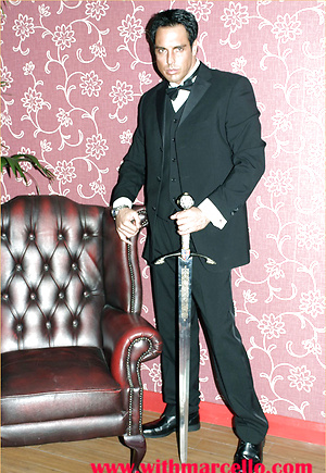 Marcello smoking a cigar in his tuxedo and then rubbing his hard dick by With Marcello image 2