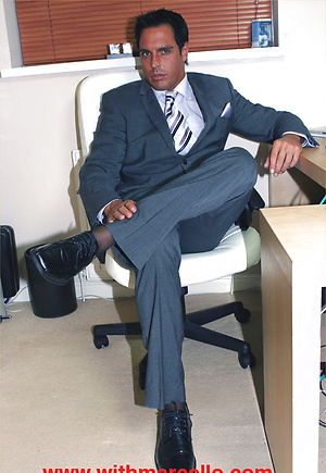 Feeling horny in his brand new fitted suit, Marcello tries out a fleshlight by With Marcello image 1