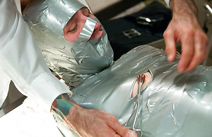 A private endures a brutal Army physical including mummification, E-Stim to cock and ass, whipping while in rope bondage and a brutal suspension fuck. by Bound Gods image 3