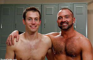 A sexy stud endures a brutal bondage workout including flogging, electro, and a hard suspension fuck from a sadistic trainer with an enormous cock. by Bound Gods image 15