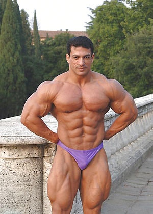 Tarek posing outdoors by Muscle Gallery image 10