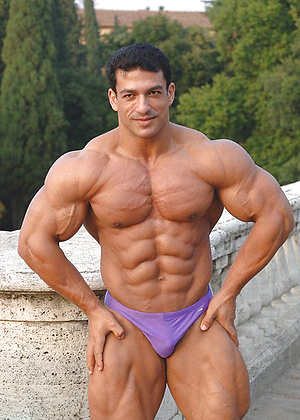Tarek posing outdoors by Muscle Gallery image 11