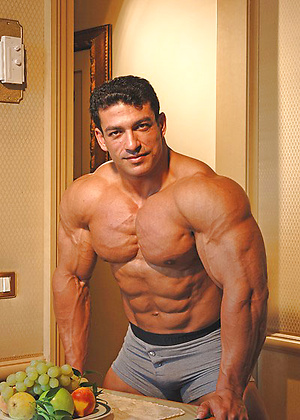 Tarek posing outdoors by Muscle Gallery image 16
