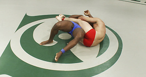 Two heavyweight fighters slam each other into the mat in an all out battle for sexual domination. by Naked Kombat image 2