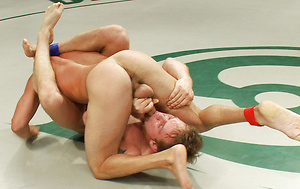 Four big dicked muscle studs fight it out to win the right to humiliate and fuck the losers in front of a live crowd in this brutal tag team match. by Naked Kombat image 5
