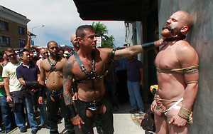A stud is stripped naked and humiliated in public.