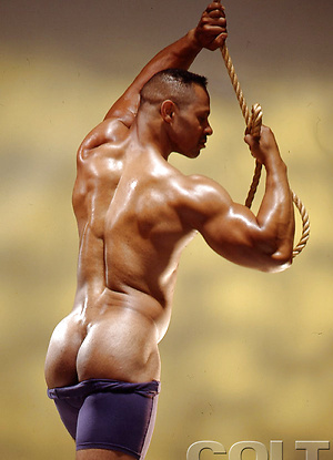 Hot bodybuilder Mitchell Rabida posing naked by Colt Studio image 4