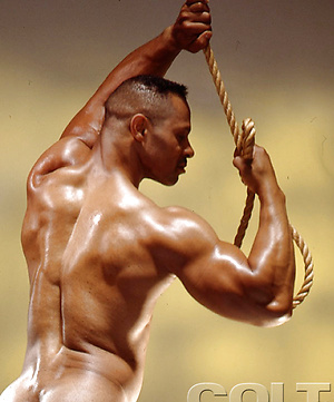 Hot bodybuilder Mitchell Rabida posing naked by Colt Studio image 5