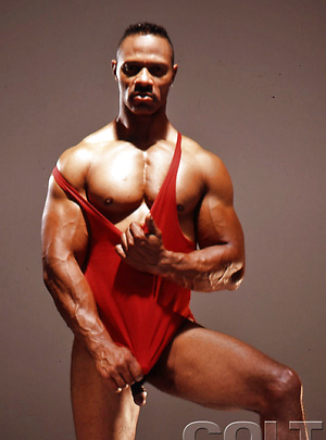 Hot bodybuilder Mitchell Rabida posing naked by Colt Studio image 12