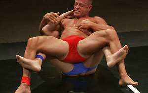 Huge dicked Tyler Saint takes on a young muscle stud. Skill and experience versus youth and endurance. Someone\\\'s getting their ass pounded either way. by Naked Kombat image 2