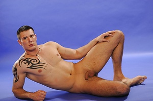 Mucled stud shows his sexy butt by William Higgins image 11