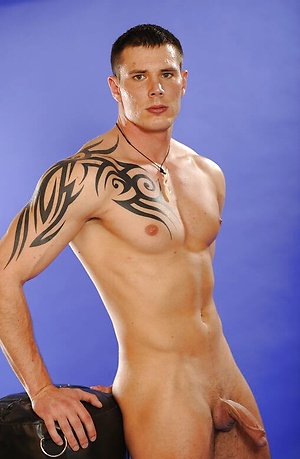 Mucled stud shows his sexy butt by William Higgins image 13