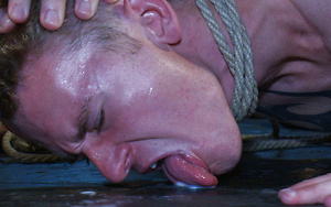Cole Brooks gets piss in the mouth by Girth Brooks and licks his cum off the dirty floor.