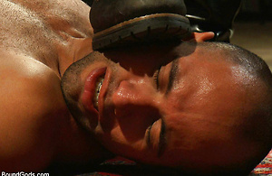 Trent Diesel and Leo Forte are kept in metal bondage and fucked during a live shoot. by Bound Gods image 2