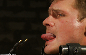 Trent Diesel and Leo Forte are kept in metal bondage and fucked during a live shoot. by Bound Gods image 15