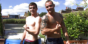 Muscle guys playing outdoors