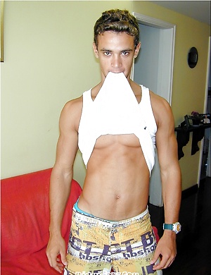 Latin guy posing by Miami Boyz image 5