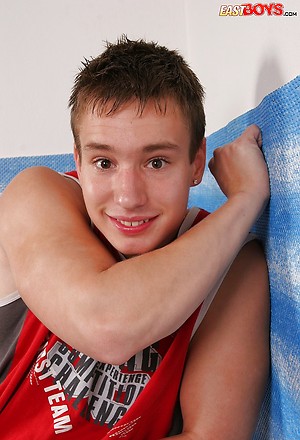 Hot jock gets naked by East Boys image 1
