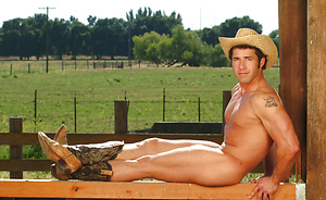 Muscled cowboy naked by Colt Studio image 7