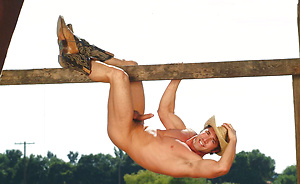Muscled cowboy naked by Colt Studio image 10