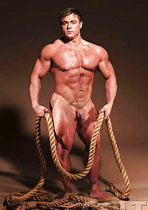 Muscle man shows cock and butt by Colt Studio image 1