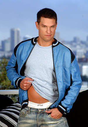 Handsome stud shows his smooth arse by Colt Studio image 1