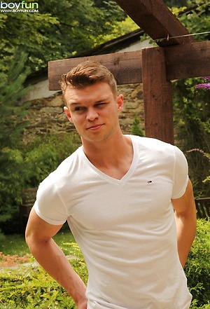 Hard bodied Justin Lovers strokes his cock outdoors. by BoyFun image 2
