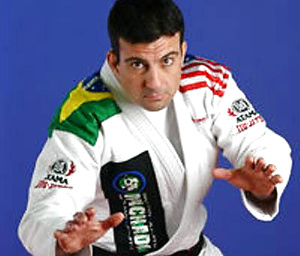 Brazilian jiu-jitsu champion Carlos Machado jerking his hard cock on video!