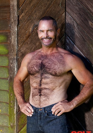 Tim Kelly shows his muscled hairy body