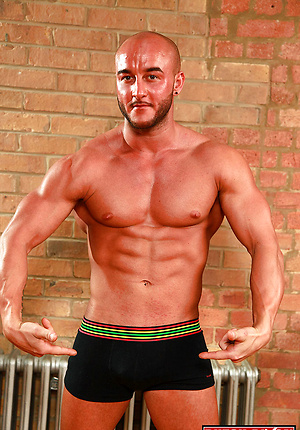 Lee David. Big, burly, Bi-sexual, with a donkey dick and bulging muscles.