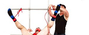 Mr. Kristofer fists Dolan Wolf by Bound Jocks image 4